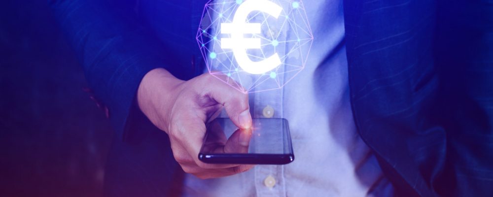 Businessman hands holding with Euro sign on global online networking virtual screen, Online banking currencies exchange financial concept.